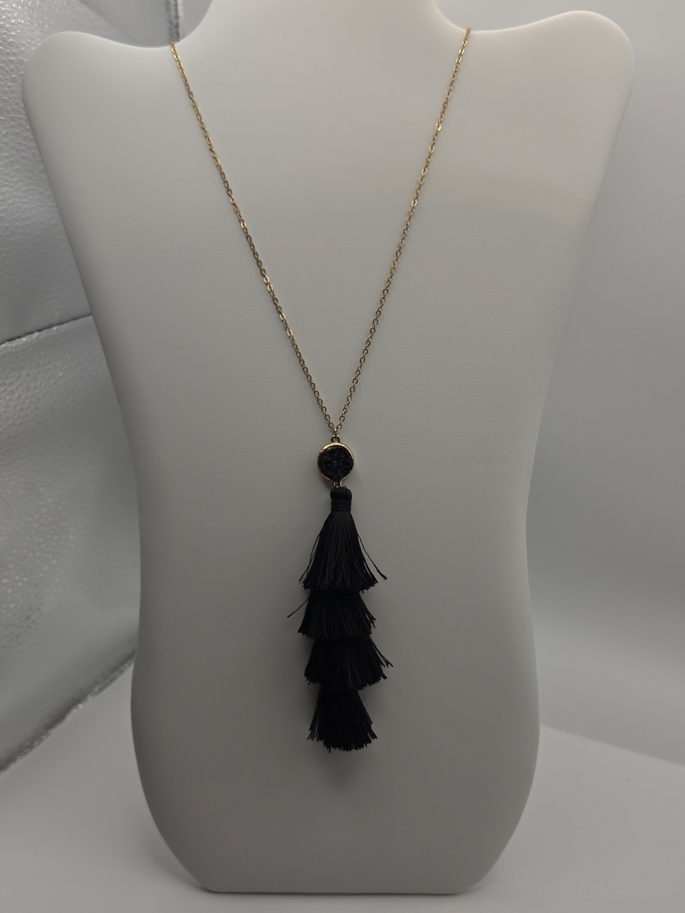 Gold Chain Necklace with Black Tiered Tassel Pendant Featuring Faux Druzy Stone